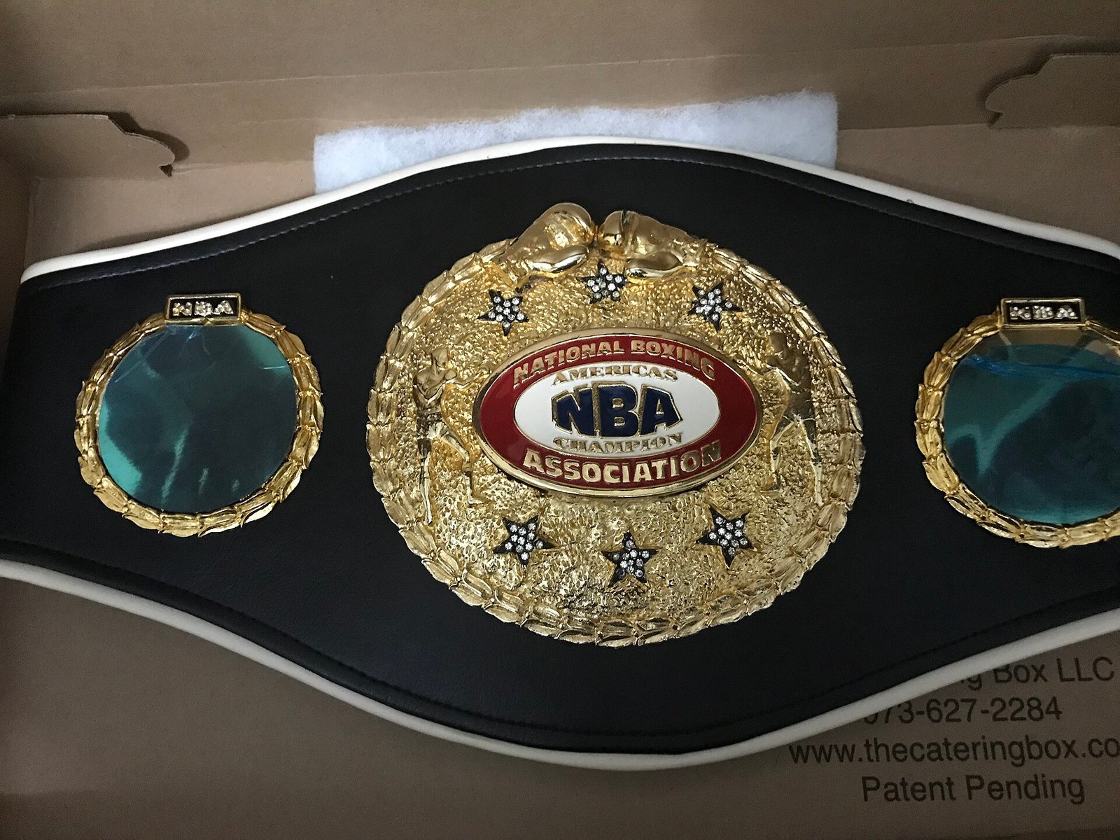 Gold and black championship belt detail