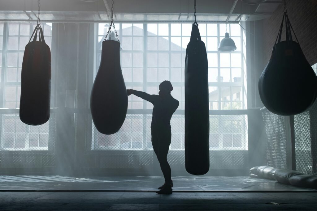 Boxing gym interior with suspended heavy bags