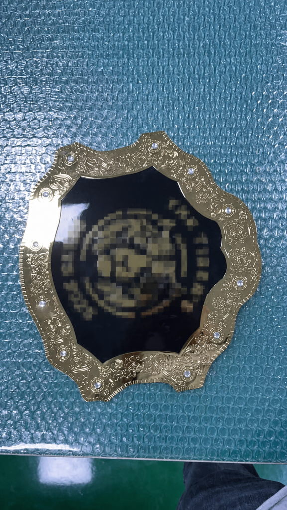 Plate close-up used to review visible finish execution